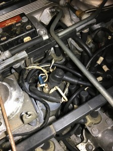 The old ignition coil in centre of the photo